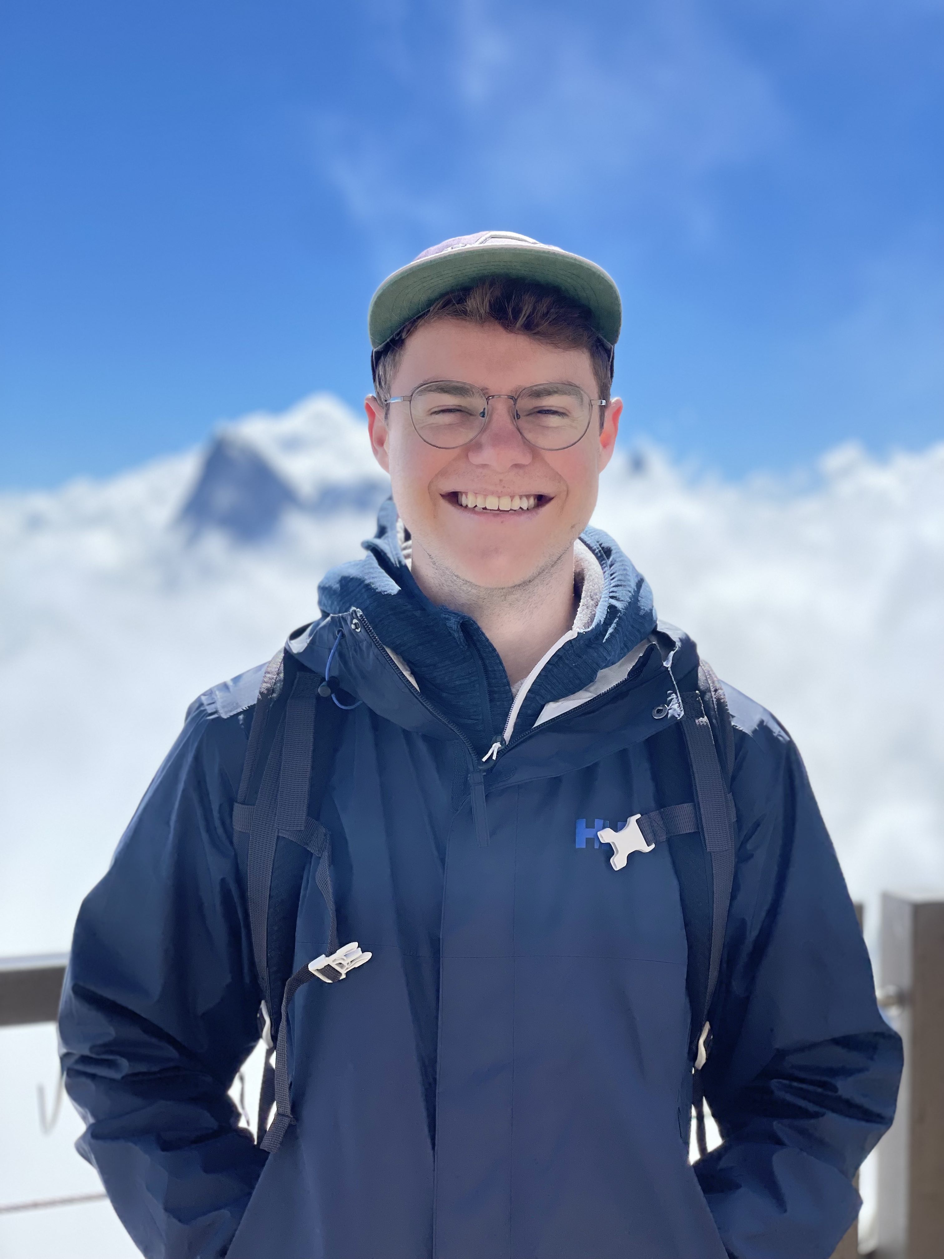 A photo of me, Zach Kelley, at the top of the Aiguille du Midi peak in the French Alps